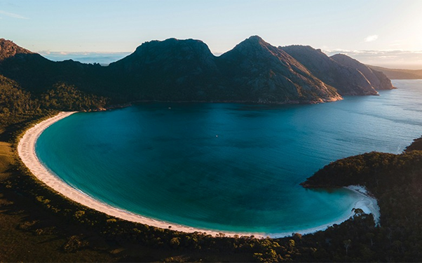aerial view of Wineglass Bay with its white sand and turquoise waters